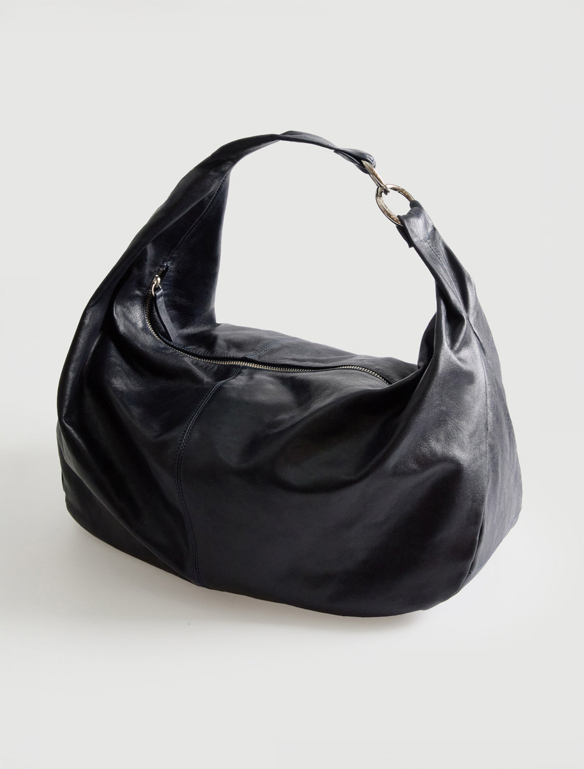 Big dry elongated wrap around hobo style shoulder bag darknavy