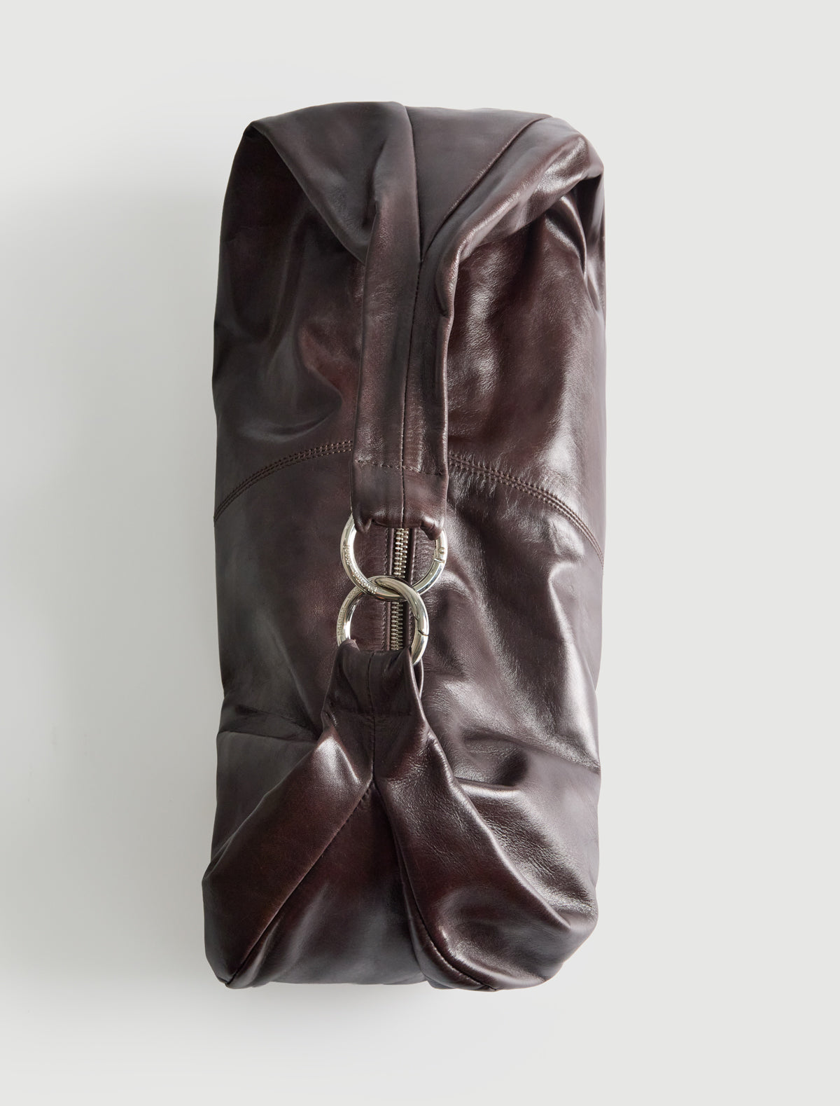 Dry elongated wrap around hobo style shoulder bag darkbrown