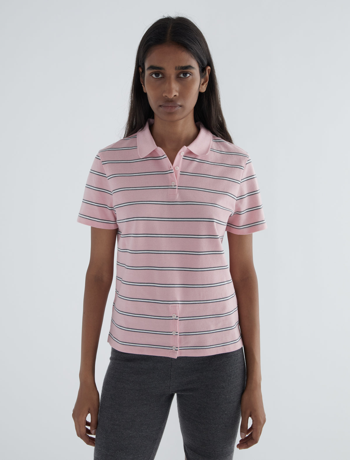 Julieta striped pique polo buttoned placket lower front pink