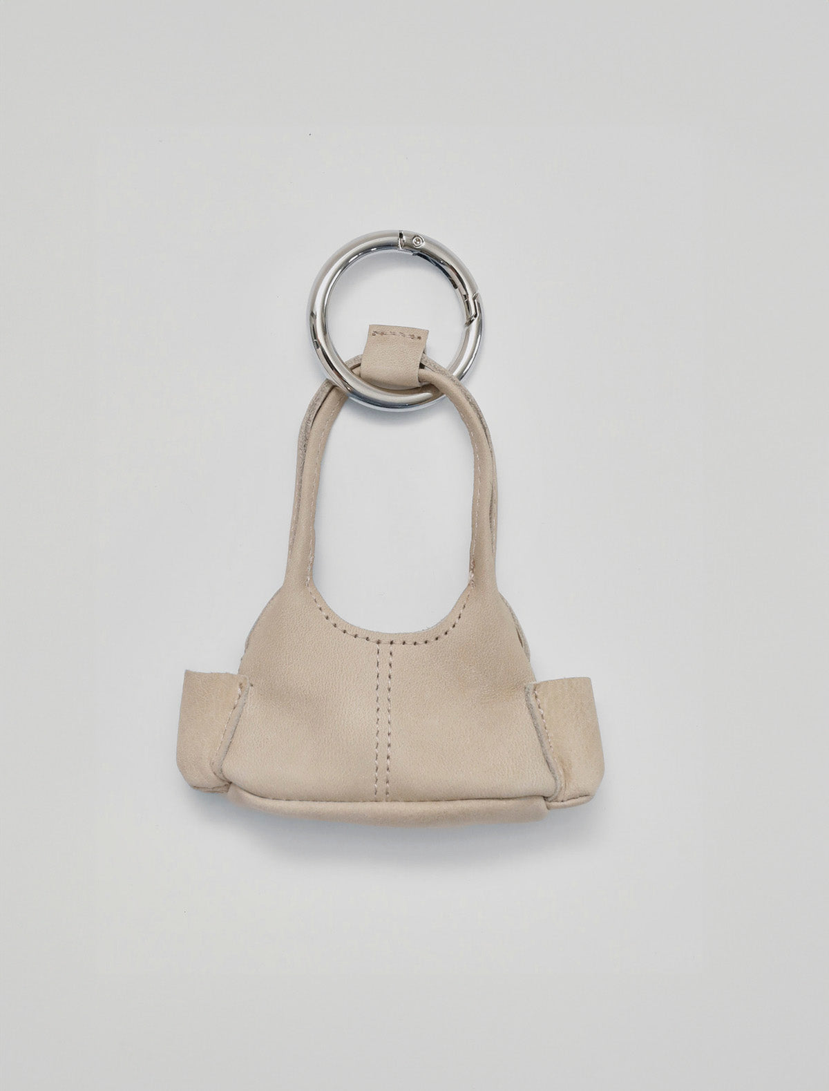 10 years miniature leather charm beige