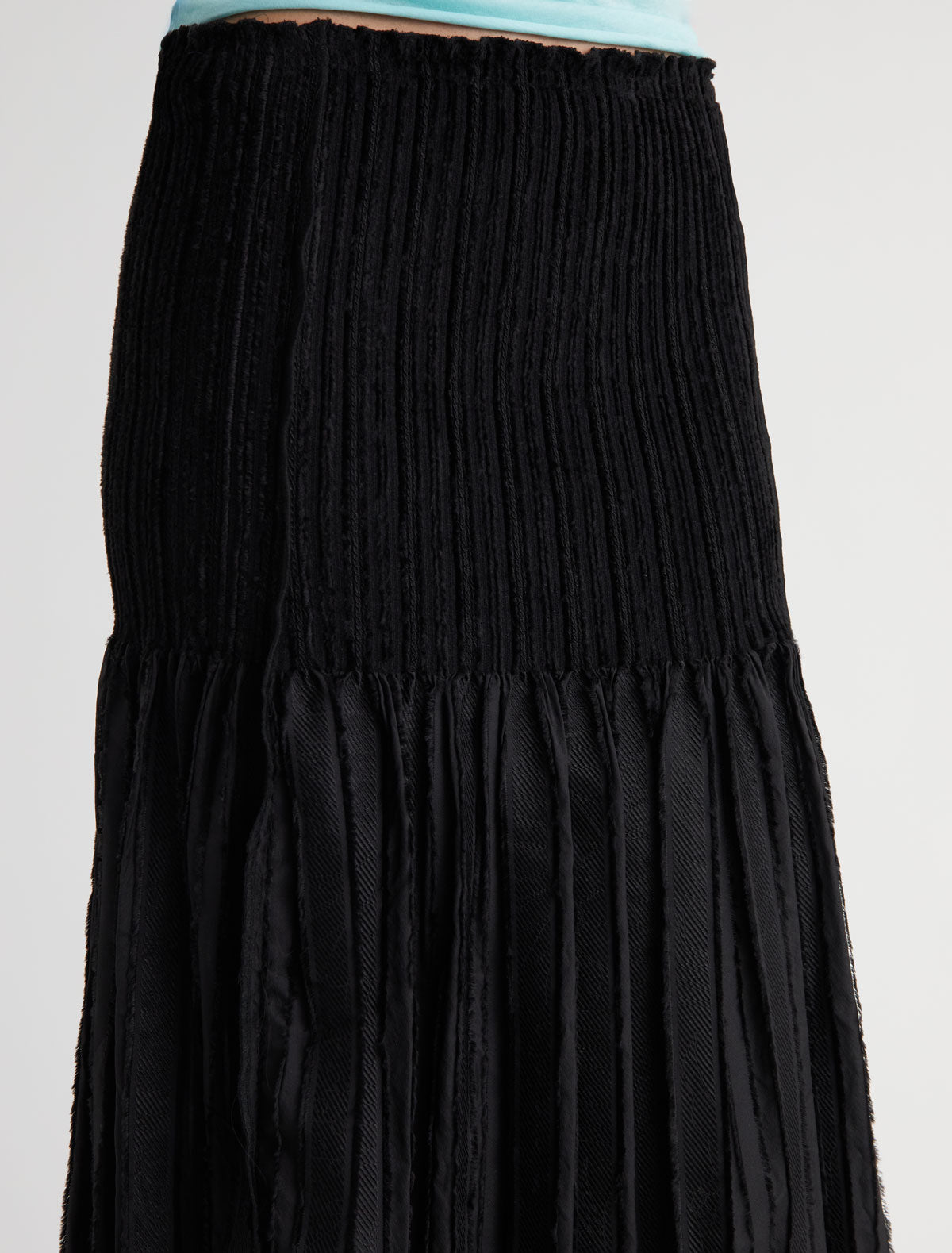 Long lupe long flared skirt fitted upper section volume bottom