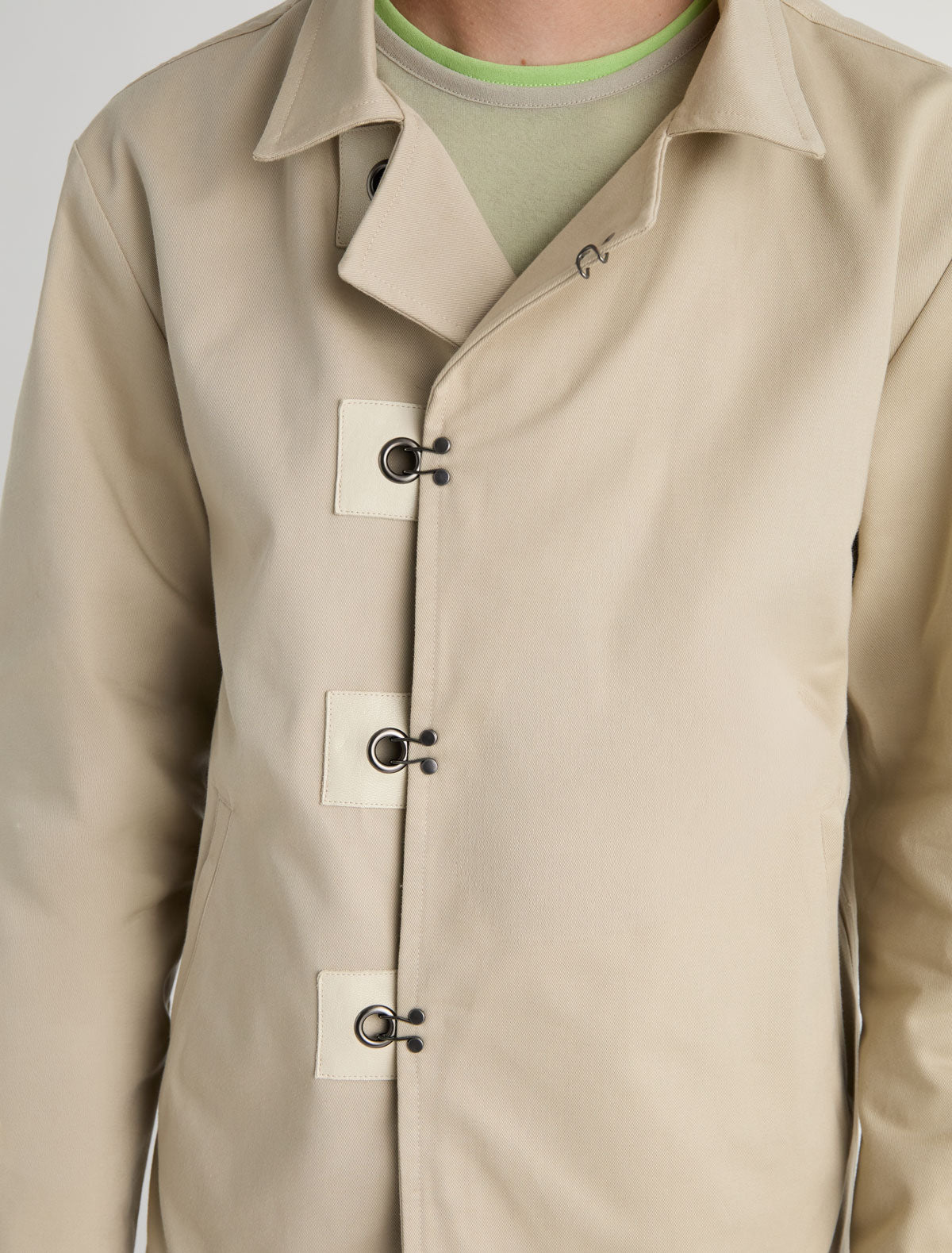Maxim twill jacket four hook and eye closures leather detailing