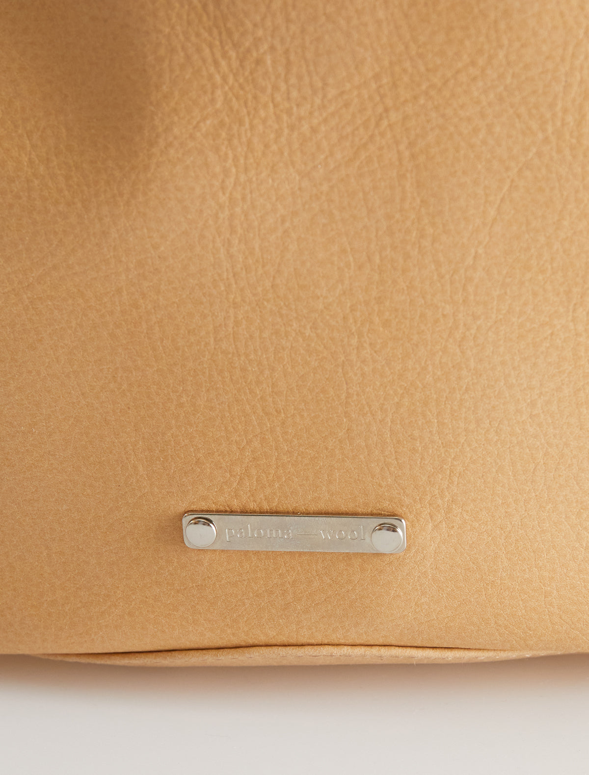 Pockets round shaped shoulder bag multiple pocket details ocher