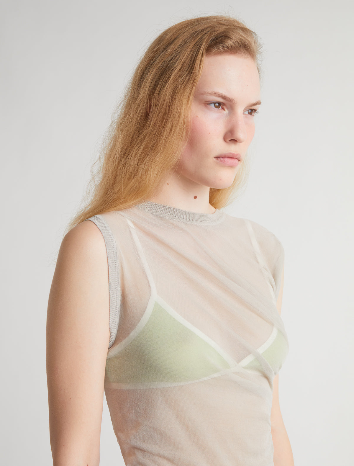 Raven ii asymmetrical knit top draped detailing beige