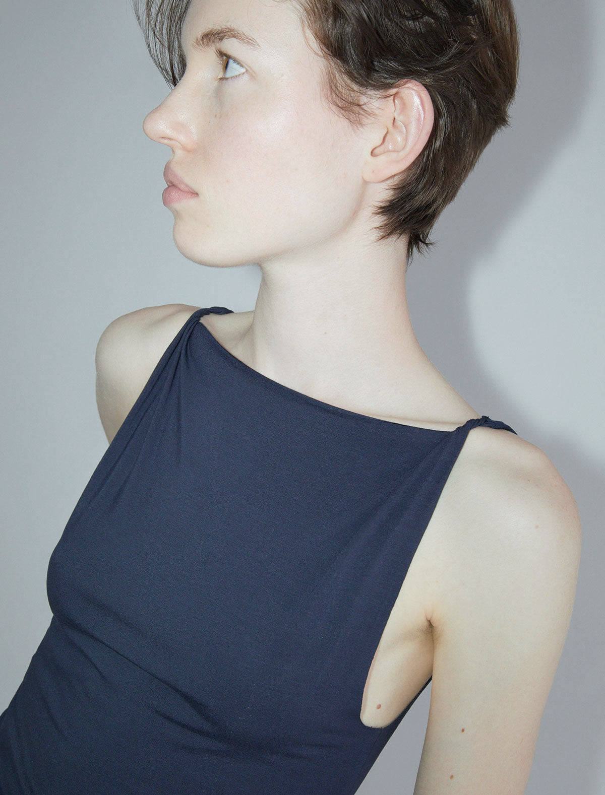 Simp sleeveless top twisted shoulder details navy