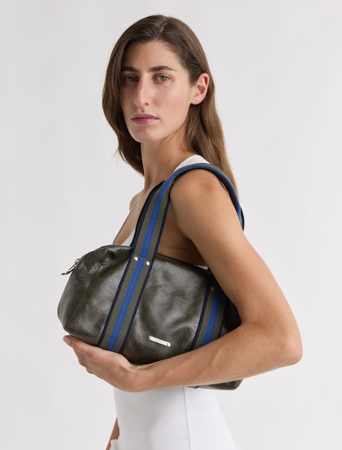 Small eira bag leather shoulder bag contrasting woven handles darkgreen