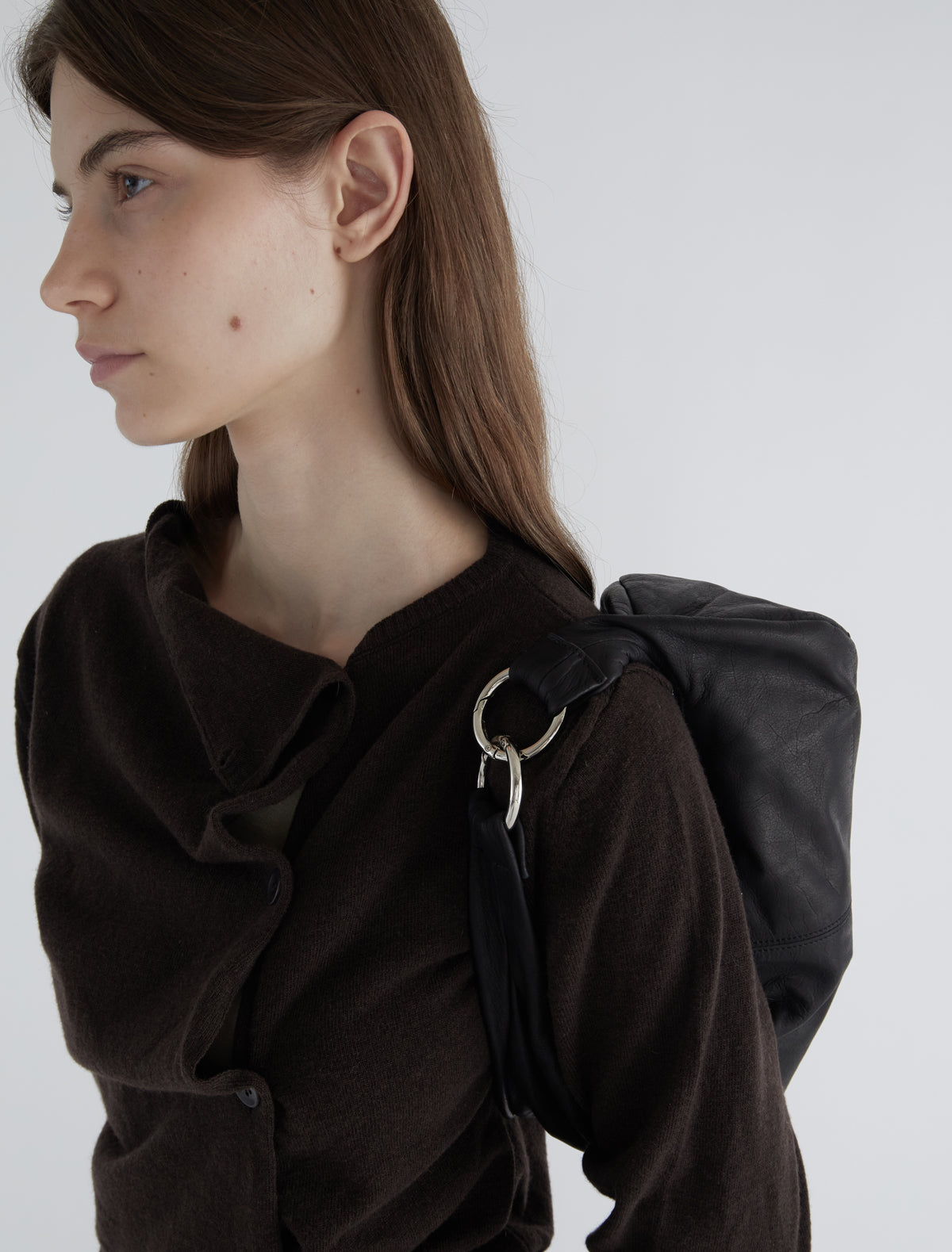 Mini dry elongated wrap around hobo style bag black