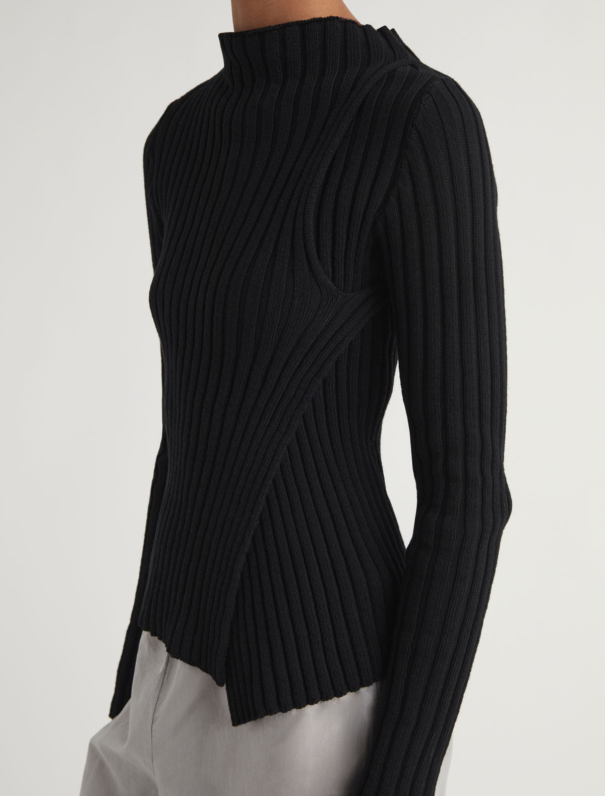 Esmolar long sleeved ribbed knit top overlaping neckline