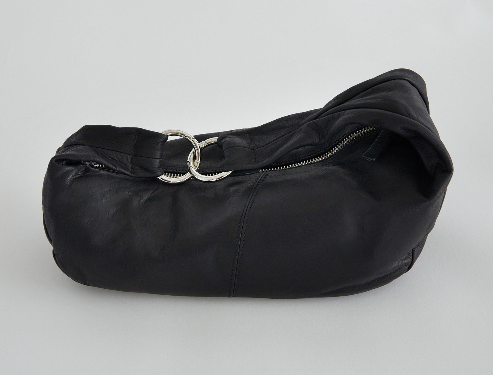 Mini dry elongated wrap around hobo style bag black