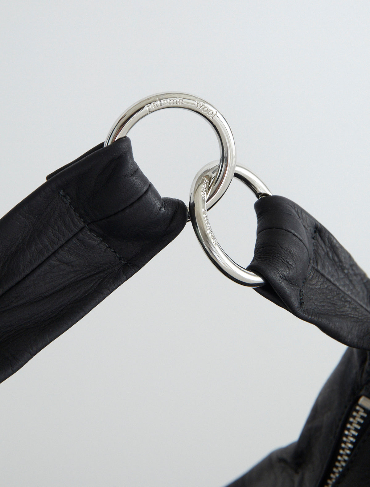 Mini dry elongated wrap around hobo style bag black