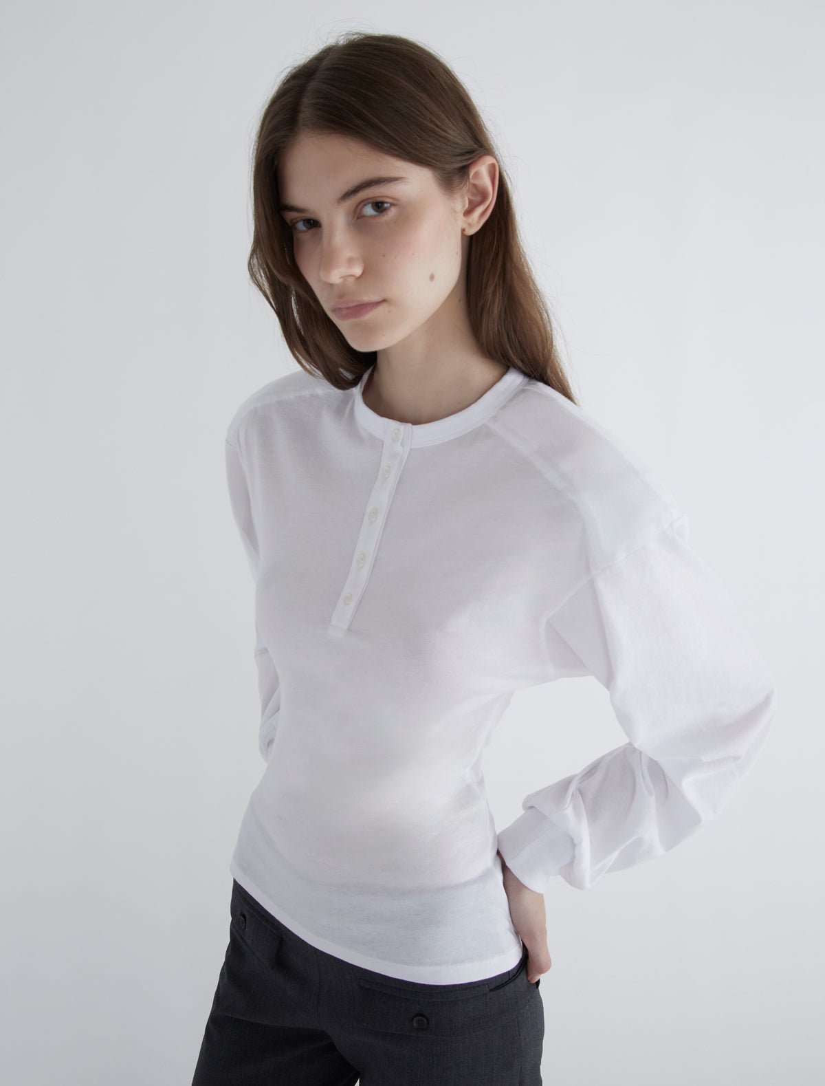 Ryno long sleeved top henley neckline shoulder pads white