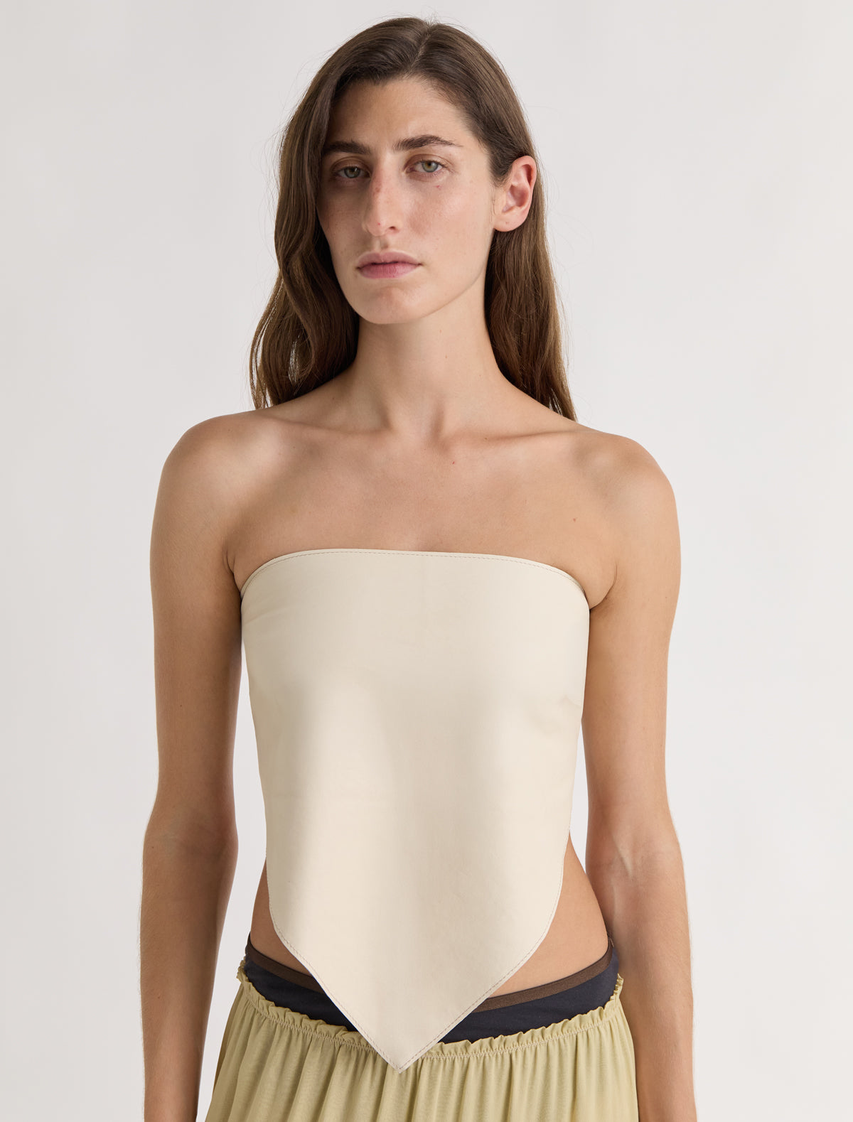 Alba top triangle shaped leather top scarf like silhouette metal buckle closure offwhite